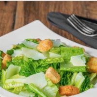 Caesar Salad · Romaine lettuce, croutons, shaved Parmesan and homemade caesar dressing.