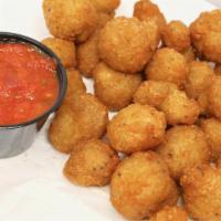Fried Mushrooms · Fresh hand-breaded mushrooms, deep-fried to a golden brown color.
