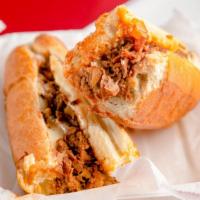 Cheesesteak (8 Oz) · A cheesesteak is a sandwich made from thinly sliced pieces of beefsteak and melted cheese in...