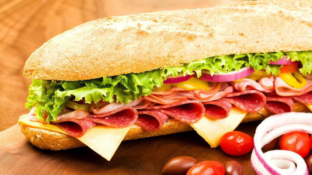 Italian Sub · Ham, salami and pepperoni with lettuce, tomatoes, onions, white American cheese and mayo.