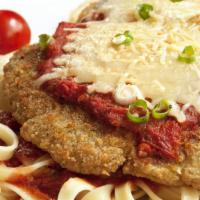 Veal Parmigiana · Breaded veal topped with marinara sauce and cheese.