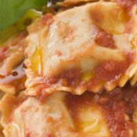 Cheese Ravioli · Cheese-filled with sprinkle of spices, baked with marinara sauce and mozzarella cheese.
