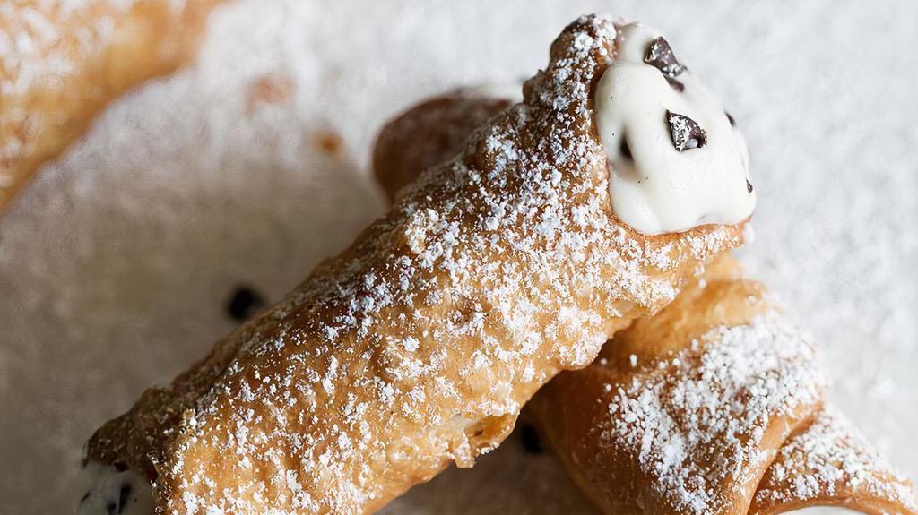 Cannoli · Filled with chocolate cream.