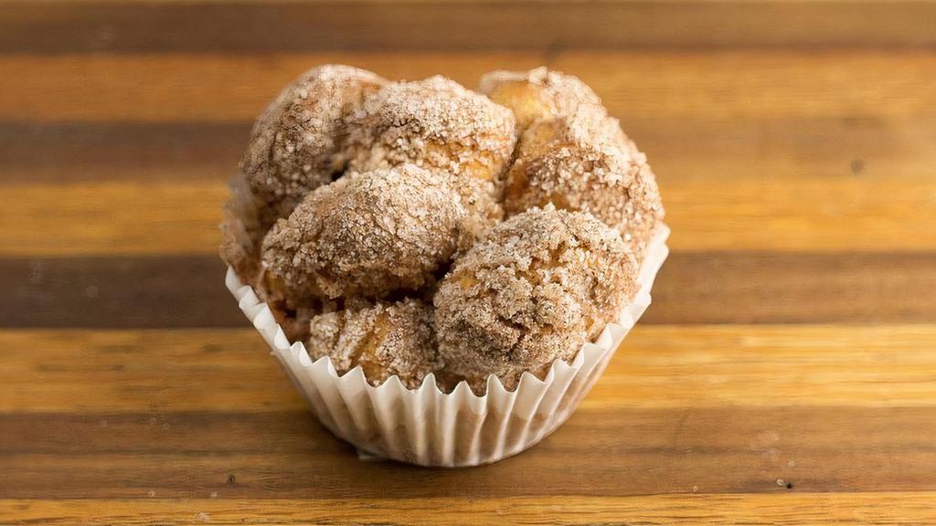 Cinna Monkey · Wonder what becomes of our donut holes at North Lime? The Cinnamonkey is the answer!!! Our donut holes rest in a cinnamon sugar blend until they rise, then are quickly placed in muffin tins and into the oven. Crunchy on top and gooey in the middle. They're fantastic!