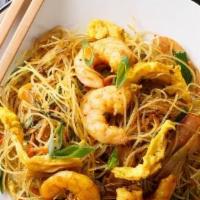 Singapore Curry Mei Fun · Rice vermicelli tossed with bean sprouts onion
Napa with light and flavorful yellow curry.
S...