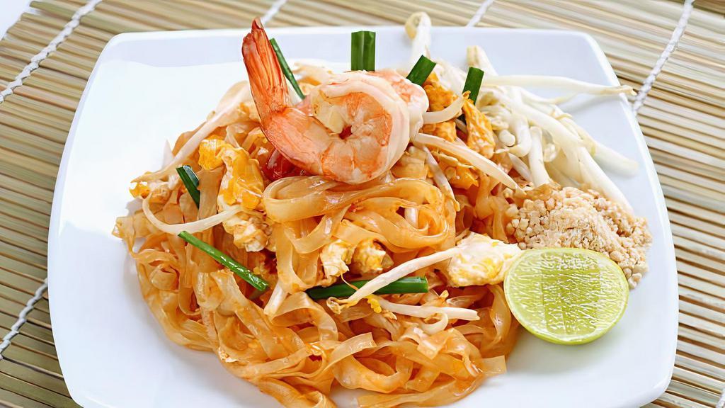 Pad Thai · Bean sprouts, scallions, egg in a sweet tangy
sauce, and topped with peanuts.