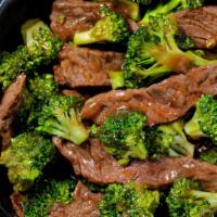 Beef With Broccoli · Tender slice beef with broccoli, carrots and onion stir fried in brown sauce.