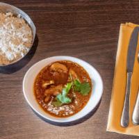 Chicken Curry · Boneless pieces of chicken cooked in a light, mildly-spiced gravy sauce.