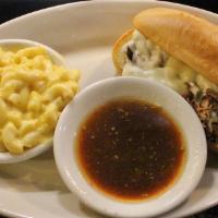 Country Dip · Tenders shreds of beef roast topped with melted provolone cheese, served on a toasted hoagie...