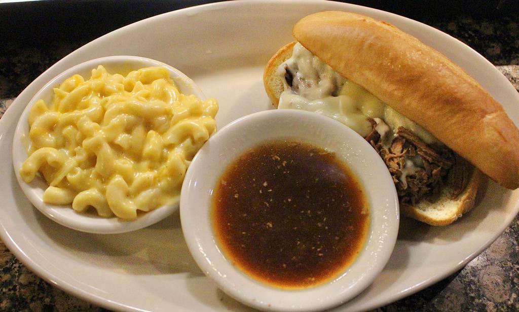 Country Dip · Tenders shreds of beef roast topped with melted provolone cheese, served on a toasted hoagie bun with a side of au jus