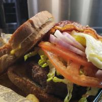 The Chuck · A hand-pattied cheeseburger between two grilled cheese 