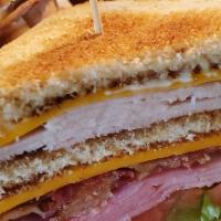 Club · Your traditional club! Sliced turkey & ham served on your choice of toasted white or wheat b...