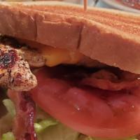 Grilled Chicken Club · Grilled chicken breast  seasoned to perfection, served on your choice of toasted white or wh...