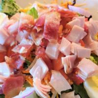 Turkey Bacon Salad · Mixed greens topped with smoked turkey, bacon, cheddar-jack cheese, shredded carrots, sliced...