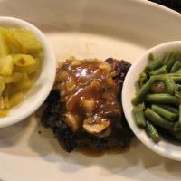 Hamburger Steak · A hand-pattied hamburger steak topped WITH GRILLED ONIONS with your choice of gravy; served ...