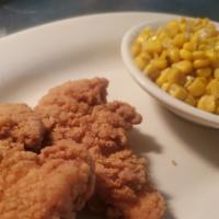 Kids Chicken Tenders · Two lightly breaded tenders with choice of side.