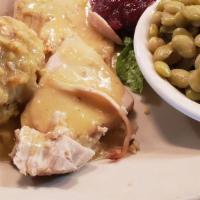 Sunday Only: Turkey & Dressing · Oven roasted turkey served with our homemade dressing, gravy, cranberry sauce & one side
