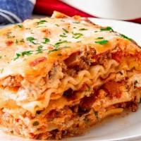 Napoli Italian Lasagna · 1.5 lb tasty ground beef cooked with our tomato sauce recipe with lasagna slices and Alfredo...