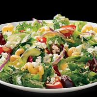 Garden Salad · Romaine with tomato cucumbers onion and Parmesan Romano cheese spring on top.