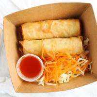 Egg Rolls-V · Egg roll wrapper stuffed with egg roll fillings (no meat). Filled with carrots, cabbage, cel...