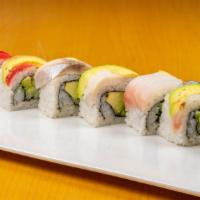 Rainbow Roll · California Roll inside, topped with avocado, salmon, tilapia and tuna.