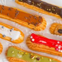 Eclair · French Eclairs.  Cream filled pastry with flavored icing on top.

Please specify flavor.