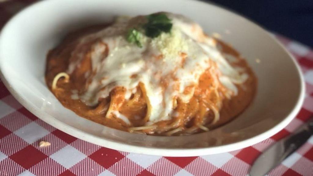 Lobster Ravioli · Ravioli stuffed with chunks of real lobster, tarragon, sherry wine, heavy cream and mozzarella cheese. In a pink sauce of alfredo and marinara, baked under more mozzarella cheese.