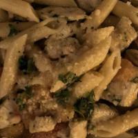 Pollo Florentine · Penne pasta with finely chopped chicken, polo florentine sauce of fresh spinach, pine nuts, ...
