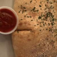 Cheese  Calzone · With mozzarella, ricotta and parmesan.