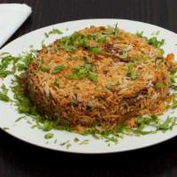 Chicken Biryani · A rice based dish made with Hyderabadi spices and fresh pieces of boneless chicken.