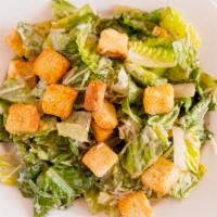 Caesar Salad · Fresh romaine tossed with Parmesan cheese, croutons and caesar dressing.
