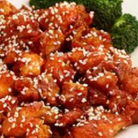 Sesame Chicken · Chunks of chicken stir fried with chefs sesame seed and hot garlic sauce. with white rice.