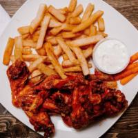 Hot Wings · Six pieces. Party. Served with a canned drink and French fries.