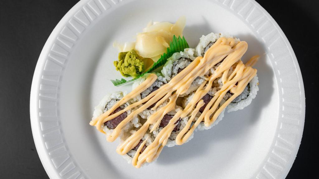 Spicy Tuna Roll · Served with Spicy. Eight pieces.