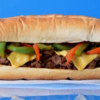 Grilled Pepper Cheesesteak · Philly cheesesteak loaded with grilled steak, melted cheese, and grilled bell peppers on a t...