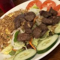 Vietnamese Shaking Beef (Bo Luc Lac) · Filet mignon sautéed in our famous Vietnamese 5 spices, served with fried rice, lettuce and ...