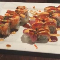 Buffalo Roll (8 Pcs) · Shrimp tempura, spicy mayo and avocado, wrapped in seared tuna, topped with wasabi yuzu dres...