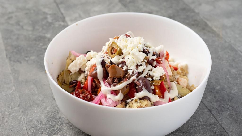 Mediterranean · Roasted all-natural chicken breast, fire-roasted tomatoes, artichokes and red peppers, pickled red onions, olives and feta cheese over quinoa with garlic-feta vinaigrette and a tzatziki drizzle