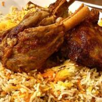 Haneeth · Slow-roasted lamb featuring special seasoning, served with rice and sahawiq (spicy dressing).