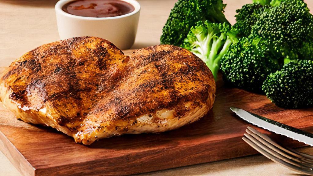 Grilled Chicken On The Barbie · Seasoned and wood-fire grilled chicken breast with our signature BBQ sauce. Served with your choice of two freshly made sides.