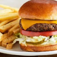 The Outbacker Burger* · Topped with lettuce, tomato, onion, house-made pickles and mustard. Served with one freshly ...
