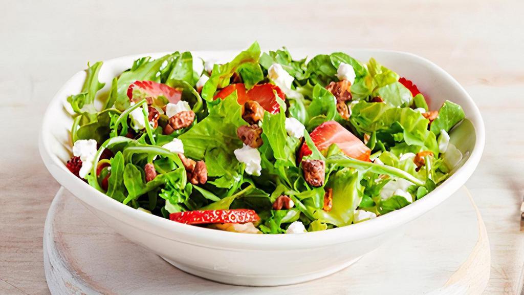 New!  Strawberry Salad · Wild arugula and crisp romaine lettuce with freshstrawberries, cinnamon pecans and goat cheese crumbles,tossed in a raspberry vinaigrette.