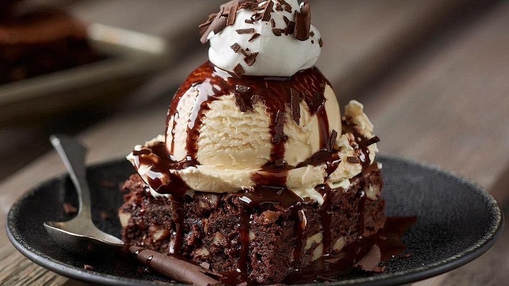 Chocolate Thunder From Down Under®** · An extra-generous pecan brownie topped with rich vanilla ice cream, our warm chocolate sauce, chocolate shavings and whipped cream.