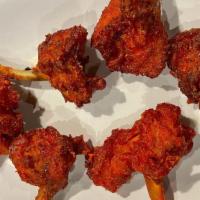 Chicken Lollipop (6 Pc) · Chicken wings marinated in zesty batter and fried
