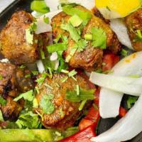 Lamb Kabab · Lamb chunks tossed with homemade spices and skewered in a clay oven