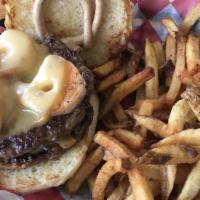 N'Awlins Burger · Choice of one or two blackened patties with Gulf shrimp, smoked Gouda cheese, caramelized on...