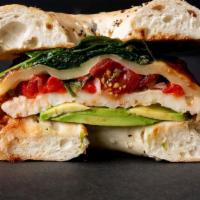 Fresh Veggies Sandwich · Toasted everything bagel with baked egg whites, pepper jack cheese, spinach, avocado, red on...
