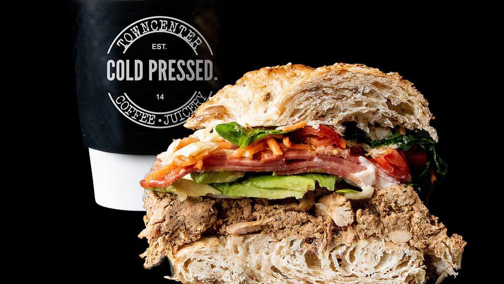 The Real Chicken Coffee/Latte Sandwich Combo · Multi-grain croissant, char roasted chicken, avocado, mayo, house slaw, tomato. 658 calories