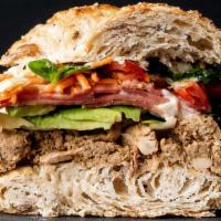 The Real Chicken Sandwich · Toasted multi-grain croissant with char roasted chicken, avocado, mayo, tomato, and TCCP gre...