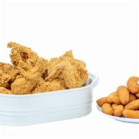 Chicken Box (12Pc) · 12 pieces of chicken : 3 Breast, 3 Wing, 3 Thigh, and 3 leg and 2 dozen hushpuppies.